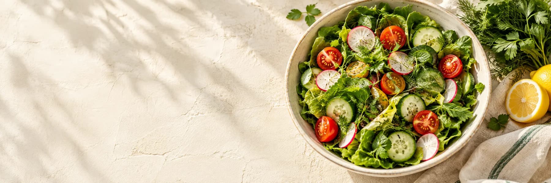 A colourful fresh salad with herbs & lemon
